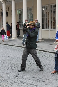 Procession Gathering: Graeme Walker photographing the mummers